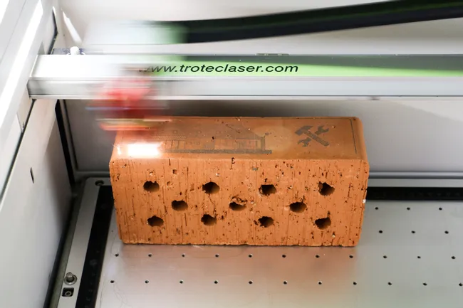 Laser engraving a brick