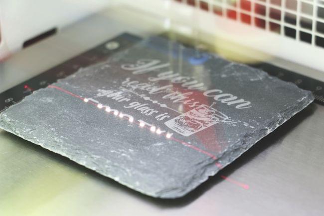 Laser engraving the slate coasters